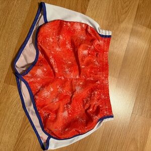 Danskin Now Athletic Shorts in Orange and White with Blue Trim